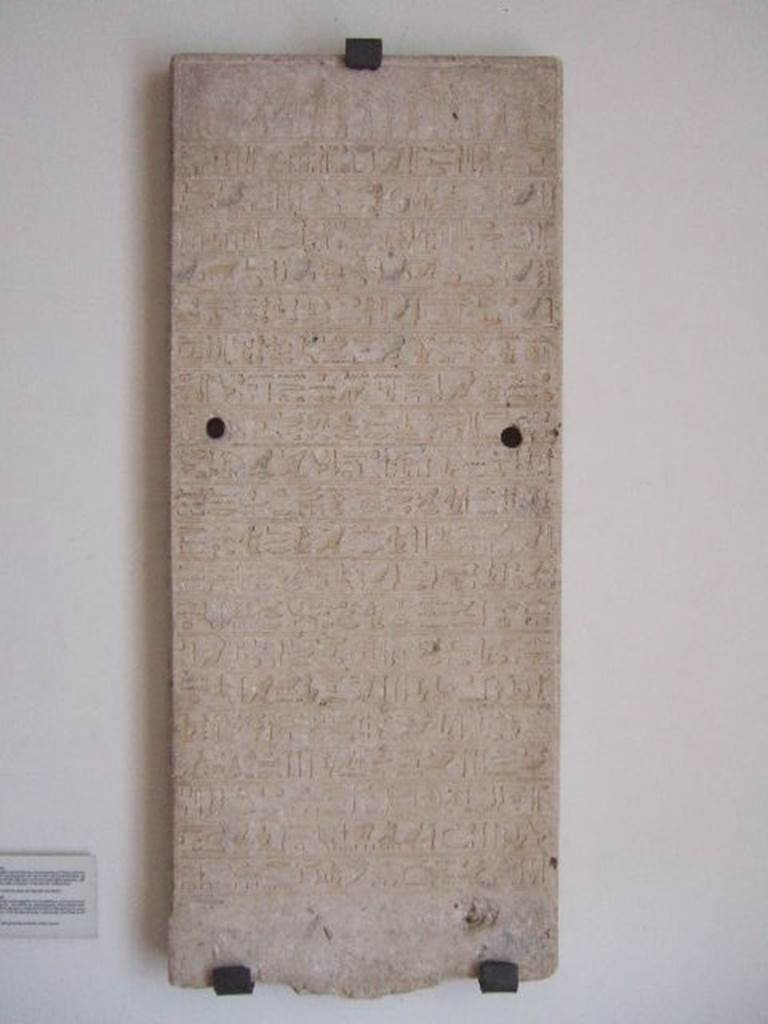 VIII.7.28 Pompeii.  Limestone stele with twenty lines of hieroglyphs.
These relate to the last twenty years of Pharoanic rule leading up to Egypt being conquered by Alexander the Great.  Found on a pillar placed at the entrance to the temple.  Now in Naples Archaeological Museum.