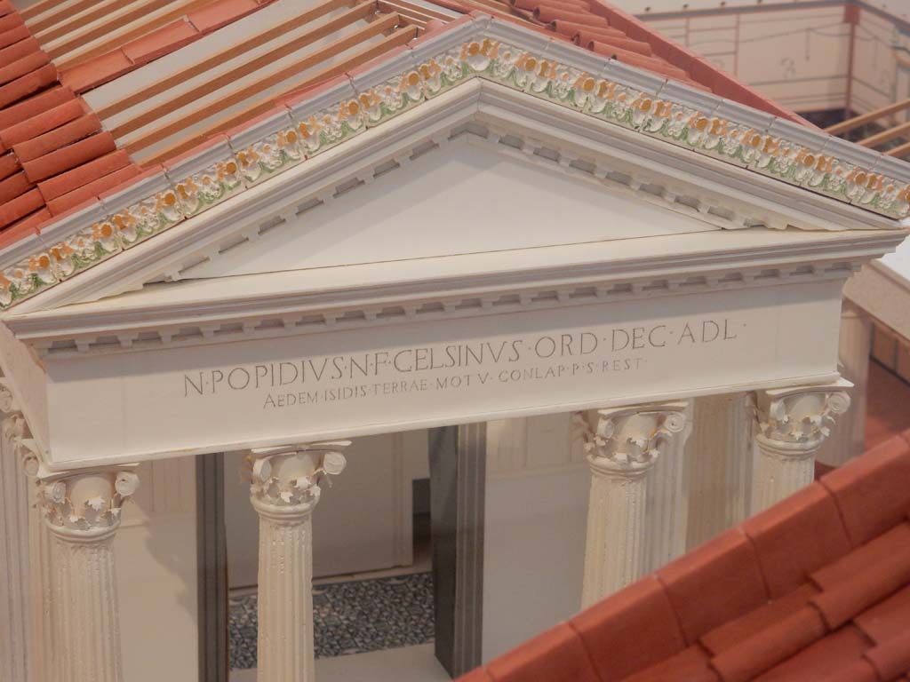 VIII.7.28 Pompeii. June 2019. Decorated pediment on east side of Temple. Model now in Naples Archaeological Museum.
Photo courtesy of Buzz Ferebee.
