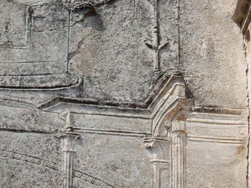 VIII.7.28, Pompeii. May 2015.  Detail of decorative stucco on north side of doorway.
Photo courtesy of Buzz Ferebee.