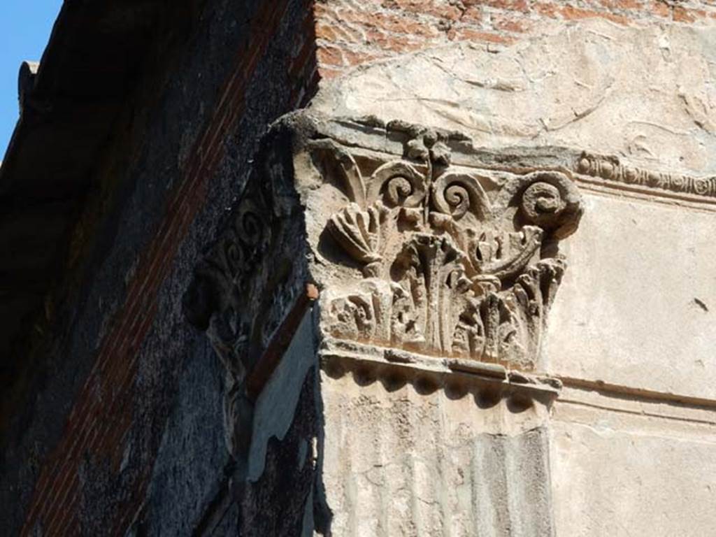 VIII.7.28, Pompeii. May 2015. Detail of decorative capital on south-west corner of cella.  Photo courtesy of Buzz Ferebee.