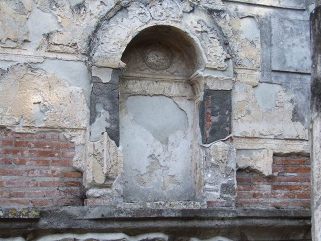 VIII.7.28 Pompeii.  December 2007. West rear wall of Temple Cella.  
Niche which contained the statue of Bacchus (Dionysus) with his panther.