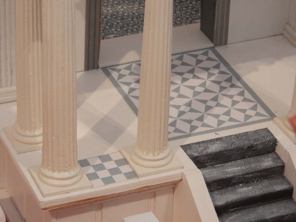 VIII.7.29 Pompeii. June 2019. Detail of decorated flooring of portico and cella. Model now in Naples Archaeological Museum. 
Photo courtesy of Buzz Ferebee.