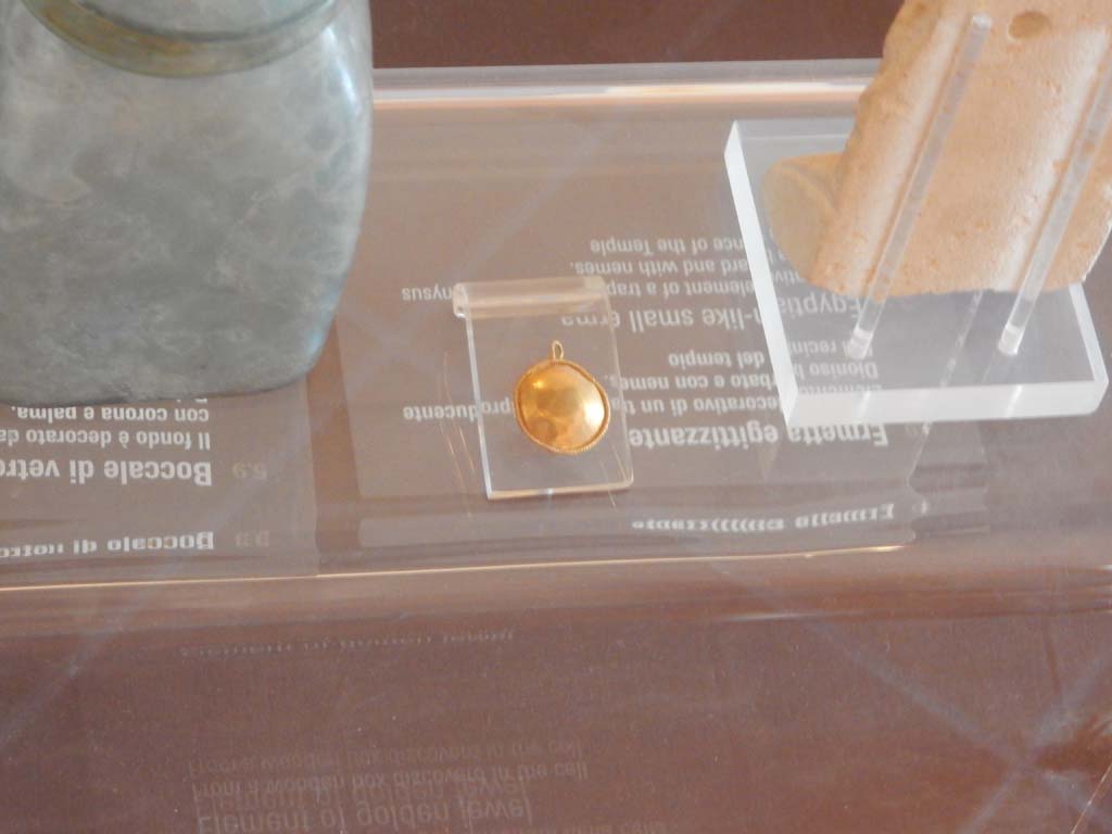 VIII.7.28 Pompeii. Gold ornament found in a wooden box in the temple cella. 
Photo courtesy of Buzz Ferebee.