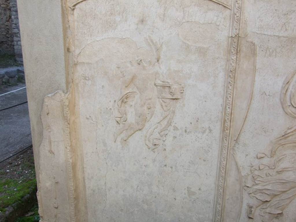 VIII.7.28 Pompeii.  December 2007. Purgatorium, east side.  Floating cupid carrying a box of incense.  See Mau, A., 1907, translated by Kelsey, F. W., Pompeii: Its Life and Art. New York: Macmillan. (p. 180).