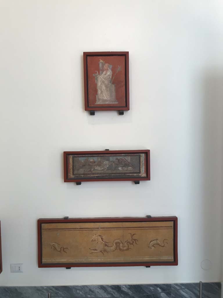 VIII.7.28 Pompeii. April 2019. Arrangement of paintings from east wall of portico.
Now in Naples Archaeological Museum. Photo courtesy of Rick Bauer.