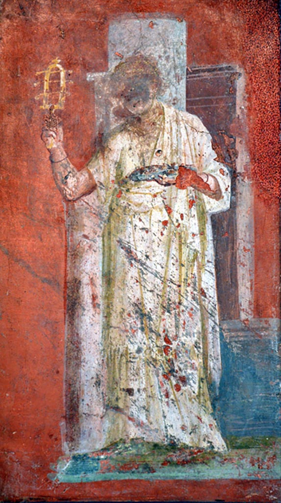 VIII.7.28 Pompeii. December 2019. Detail from painted panel from south portico.
A priestess, with hair gathered behind the head, is shaking a sistrum.
This is the only painting of a woman in the eight paintings of priests from the walls of the portico.
Now in Naples Archaeological Museum. Inventory number 8923.
Photo courtesy of Giuseppe Ciaramella.