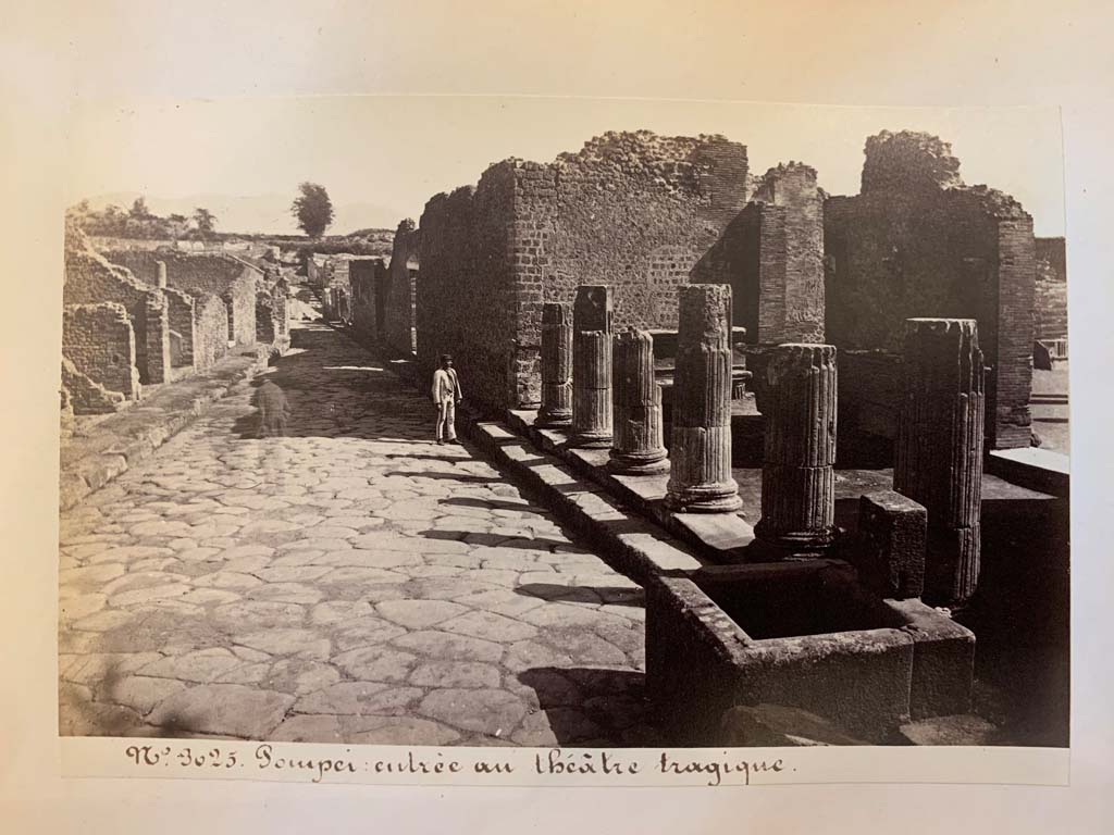 VIII.4, Pompeii, on left.  Via del Tempio d’Iside from entrance to Triangular Forum.    VIII.7.30, on right.  
From an album of Michele Amodio dated 1874, entitled “Pompei, destroyed on 23 November 79, discovered in 1745”. 
Looking east along Via del Tempio d’Iside. Photo courtesy of Rick Bauer.