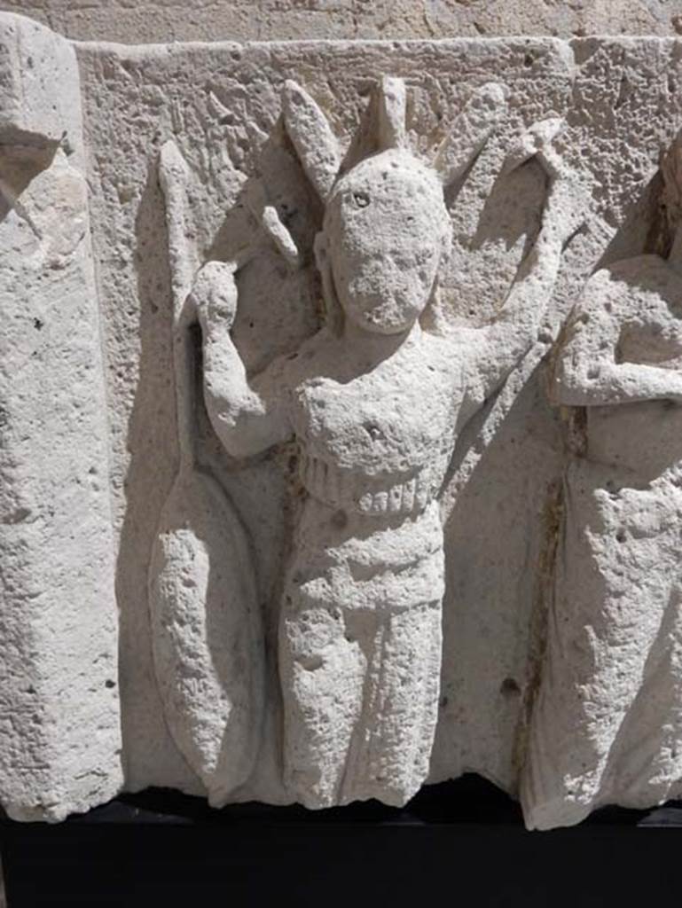 VIII.7.31 Pompeii, May 2018. Detail of Athena, with shield, spear and holding tools, maybe hammer. Photo courtesy of Buzz Ferebee.