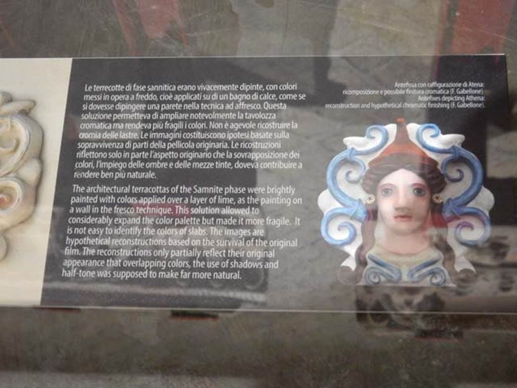 VIII.7.31 Pompeii, May 2018. Architectural terracotta’s from the Samnite phase were brightly painted.
Antiquarium information card showing hypothetical colour reconstruction based on surviving material. 
Photo courtesy of Buzz Ferebee.