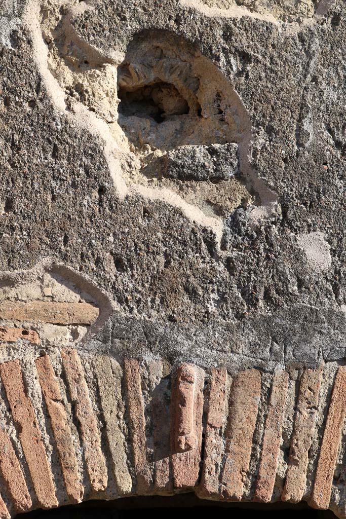 IX.1.3/33 Pompeii. December 2018. 
Recess above oven, and terracotta phallus in brickwork. Photo courtesy of Aude Durand.
