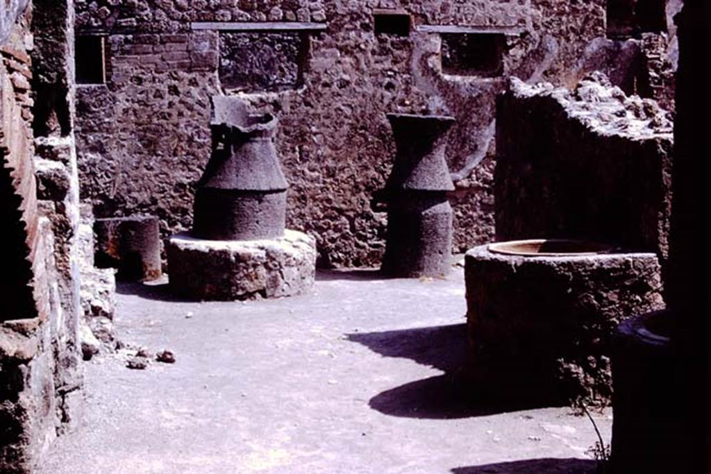 IX.1.3/ IX.1.33 Pompeii. 1966. Looking south across bakery from near oven. Photo by Stanley A. Jashemski.
Source: The Wilhelmina and Stanley A. Jashemski archive in the University of Maryland Library, Special Collections (See collection page) and made available under the Creative Commons Attribution-Non Commercial License v.4. See Licence and use details.
J66f0121