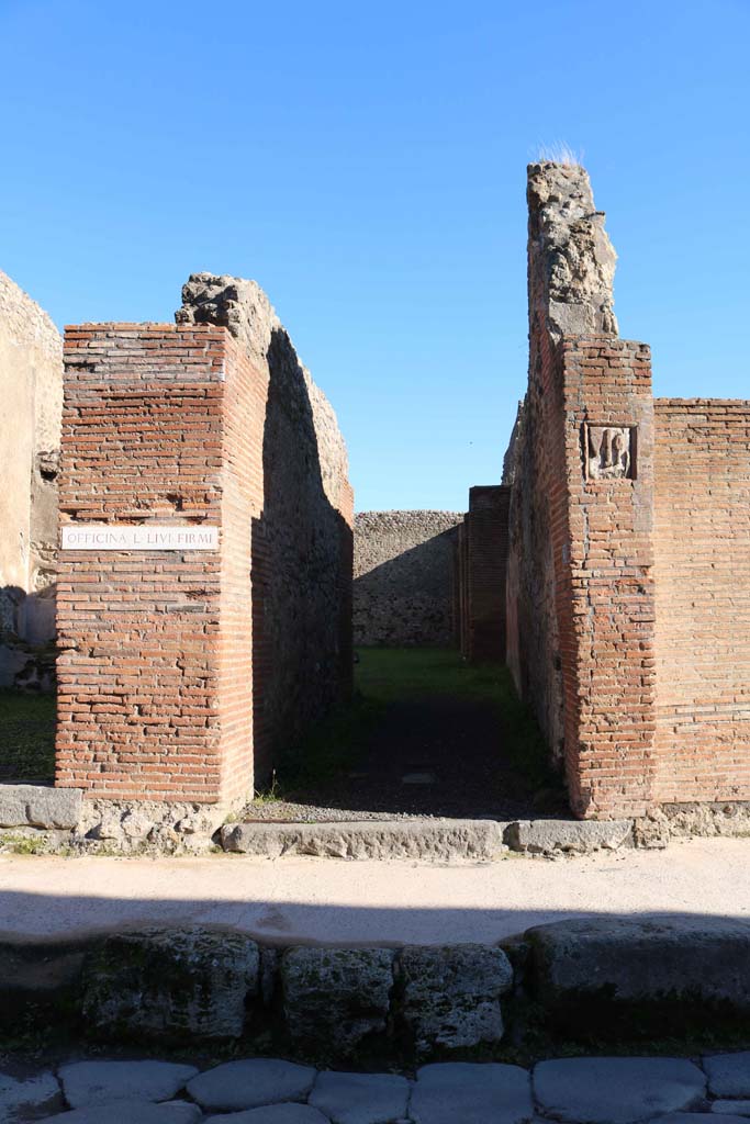 IX.1.5 Pompeii. December 2018. 
Entrance doorway on east side of Via Stabiana. Photo courtesy of Aude Durand.