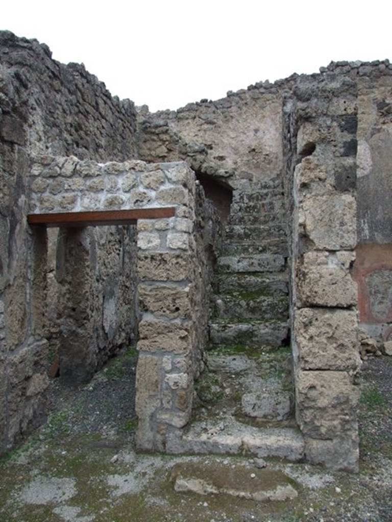 IX.1.12 December 2007.  Stone steps to upper floor.