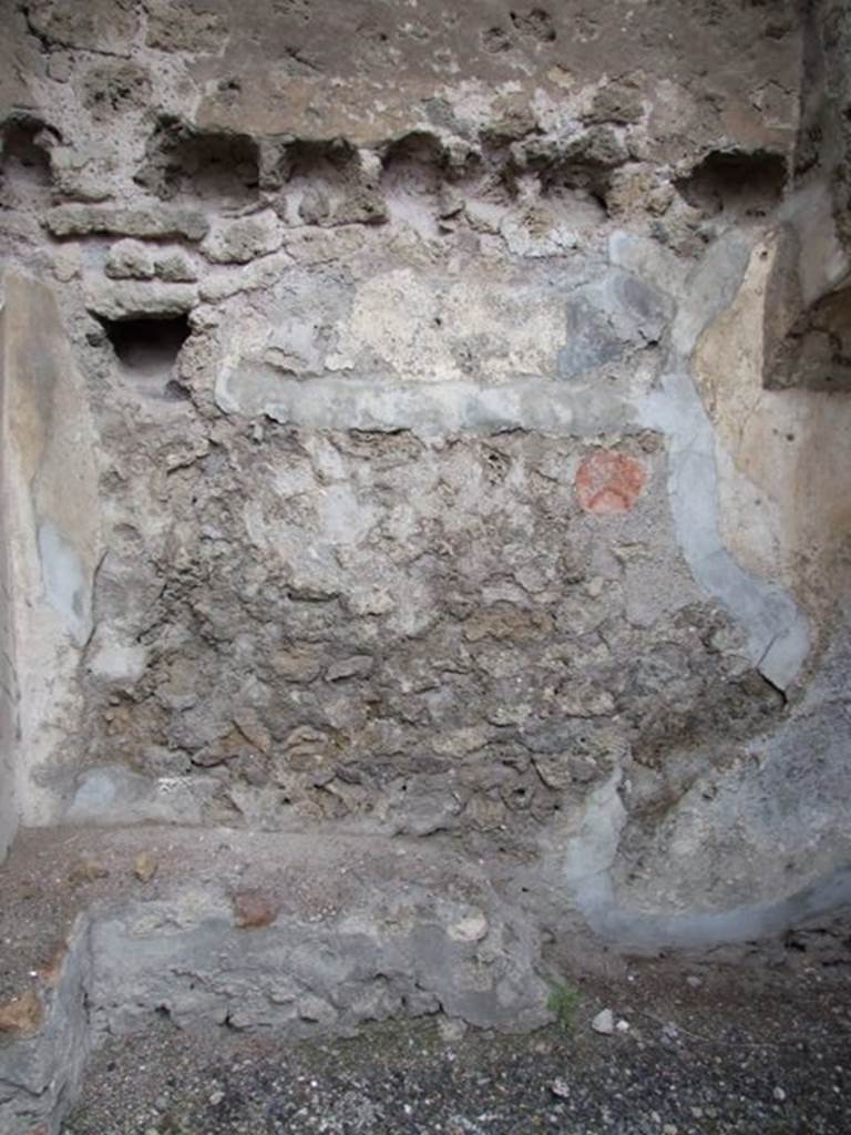 IX.1.12  Pompeii. December 2007.  North wall of room at end of corridor on north-west side of peristyle under the stone steps.