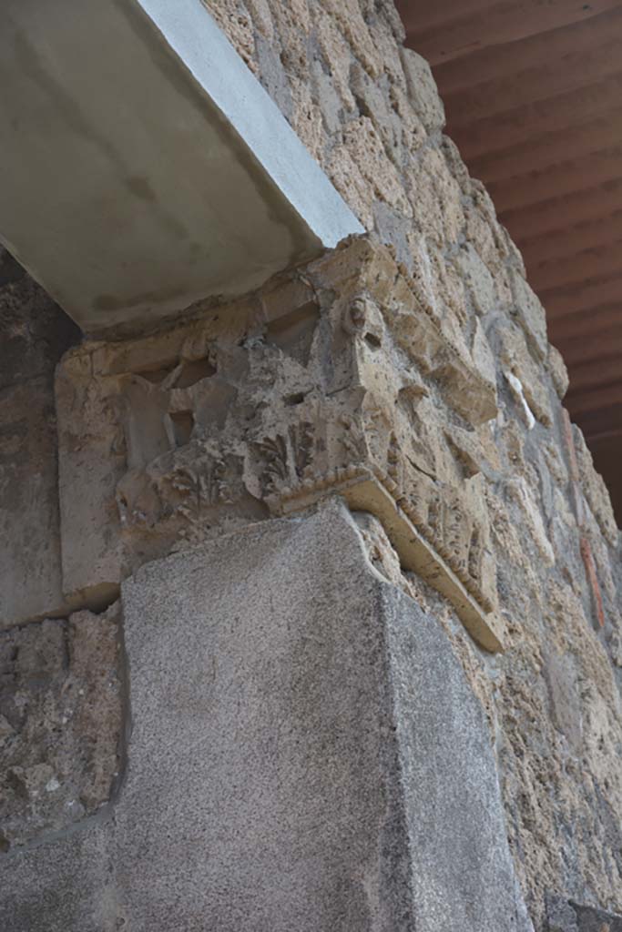 IX.1.20 Pompeii. September 2019. Room 2, east side of atrium.  
Figured capital from south-eastern corner of east ala 6, consisting of a bust above a band of acanthus (damaged).
 Foto Annette Haug, ERC Grant 681269 DÉCOR