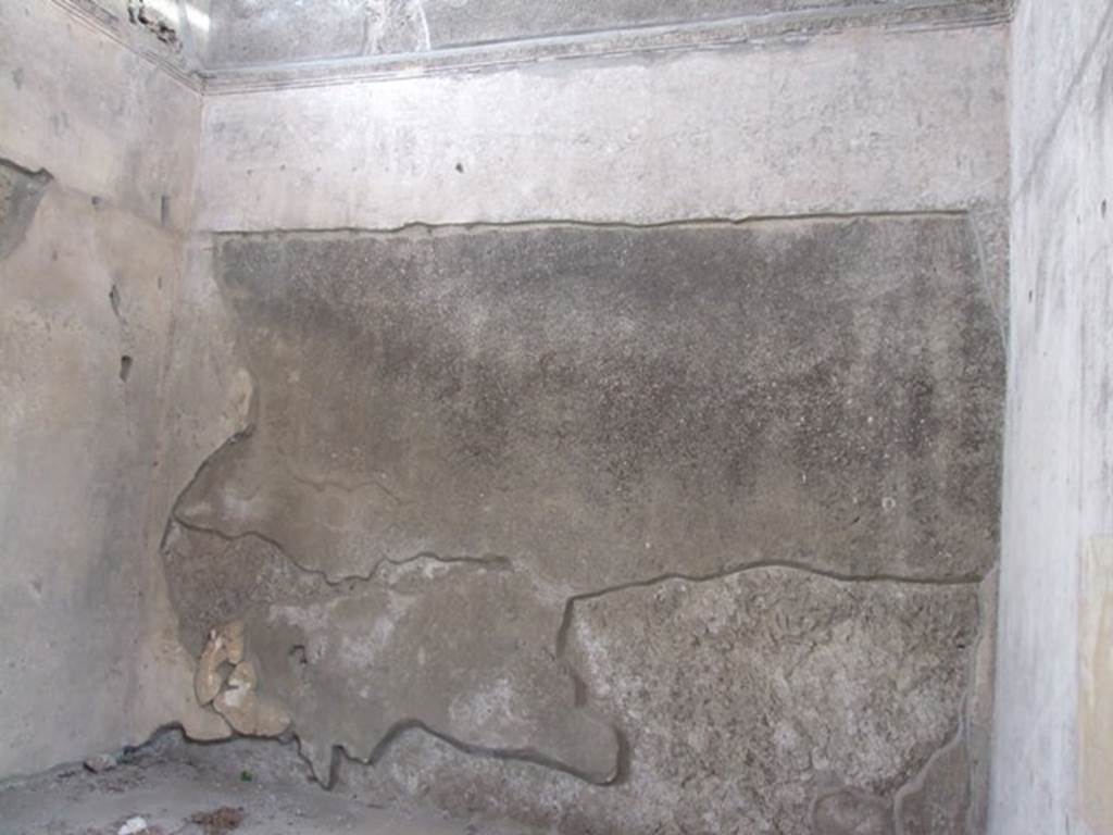 IX.1.20 Pompeii. December 2007. Room 9, remains of wall painting on east wall.  Mau states the painting in the centre of the east Wall, seems to relate to Apollo but the subject has not been explained.  See Mau, A., 1907, translated by Kelsey F. W. Pompeii: Its Life and Art. New York: Macmillan. (p.312).