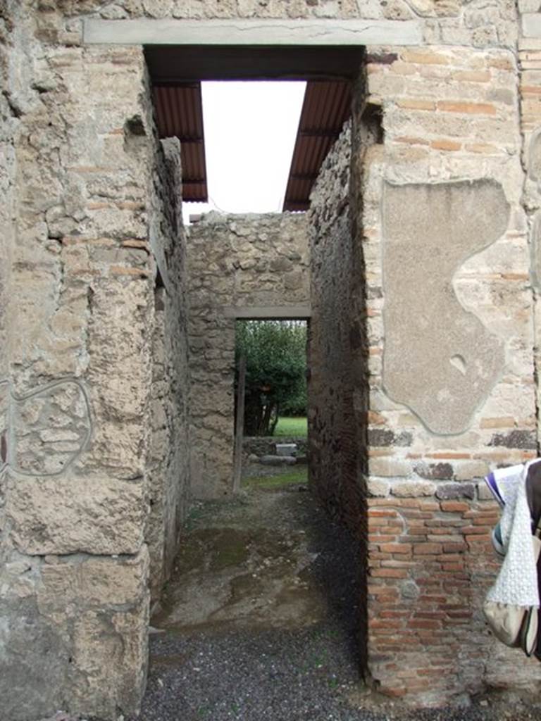 IX.1.20 Pompeii.  December 2007.  Room 11. Passage from atrium to Garden and kitchen area.