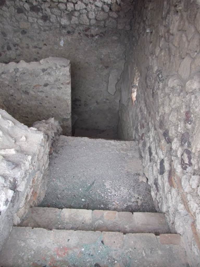 IX.1.20 Pompeii.  December 2007.  Looking down staircase at the rear of Room 15.
