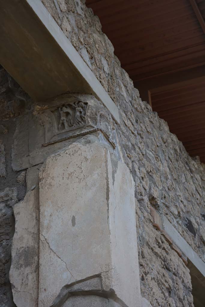 IX.1.20 Pompeii. September 2019. Room 2, west side of atrium. 
Looking towards north side of west ala 18, with damaged front face of capital facing onto atrium.
Foto Annette Haug, ERC Grant 681269 DÉCOR