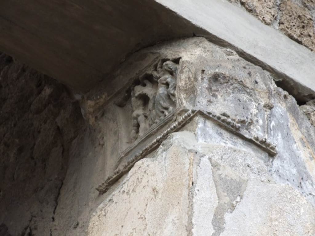 IX.1.20 Pompeii.  December 2007.  Room 2 Atrium, West Side. Damaged front face of capital from north western corner.