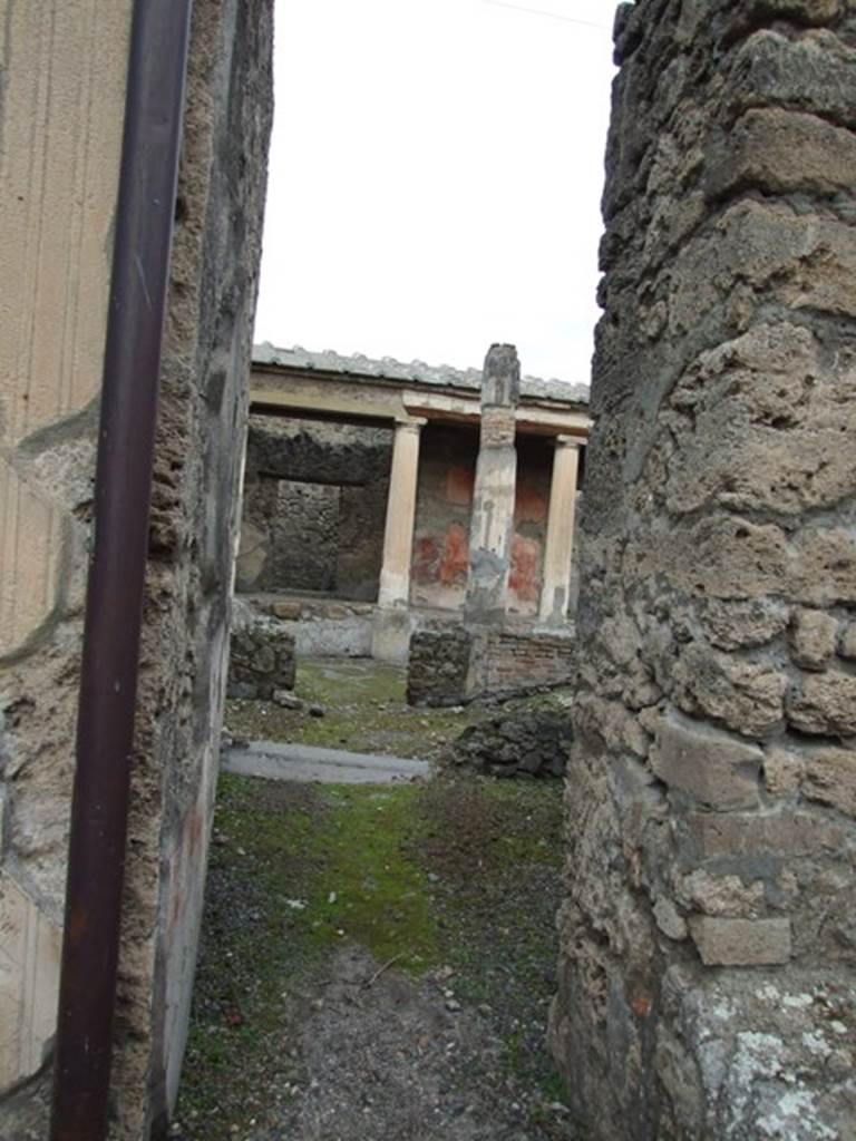 IX.1.22 Pompeii. December 2007.  Doorway to corridor with small room on its eastern side, between room 6 and room 7. According to Bragantini, when found this room had a black dado, and the middle zone was painted with purple panels separated by borders. 
See Bragantini, de Vos, Badoni, 1986. Pitture e Pavimenti di Pompei, Parte 3. Rome: ICCD. (p.401, corridoio ‘k’)