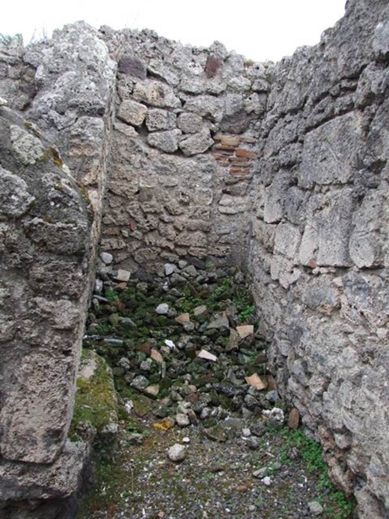 IX.1.22 Pompeii. December 2007.  Small room, containing the stairs to the upper floor, on east side of corridor between room 6 and room 7.