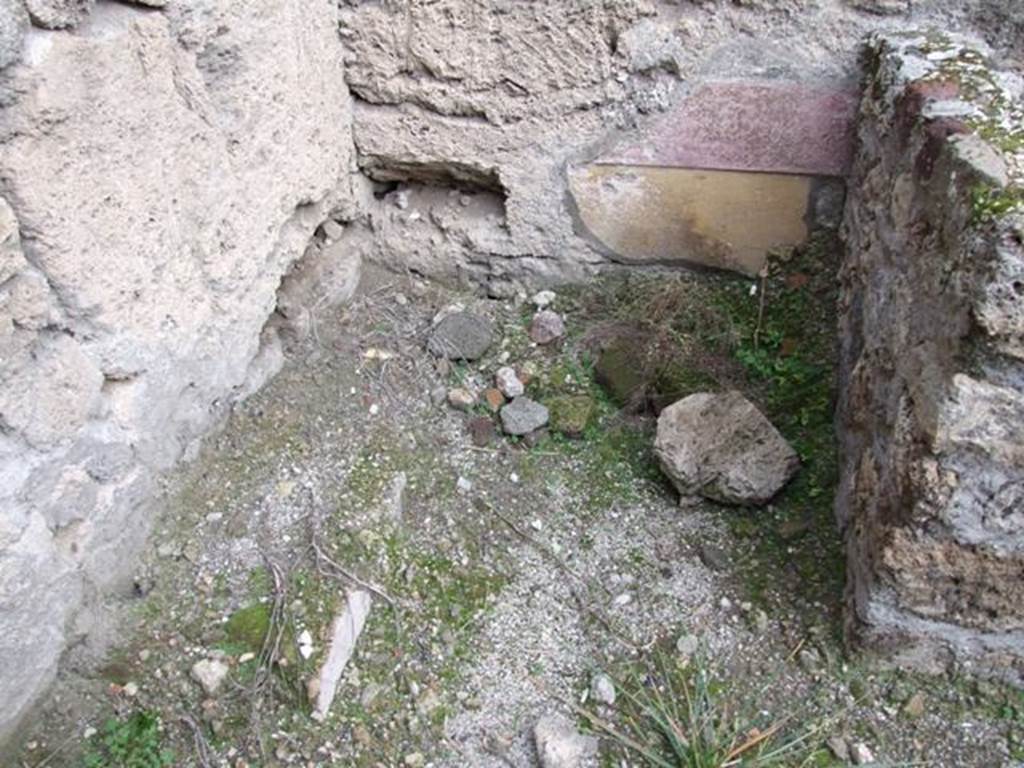 IX.1.22 Pompeii. December 2007. Room 18, latrine in north-east corner of kitchen. According to Bragantini, the walls of the kitchen and latrine would have shown a yellow dado and purple in the middle zone.
See Bragantini, de Vos, Badoni, 1986. Pitture e Pavimenti di Pompei, Parte 3. Rome: ICCD. (p.403, cucina ‘t’ con latrina)
