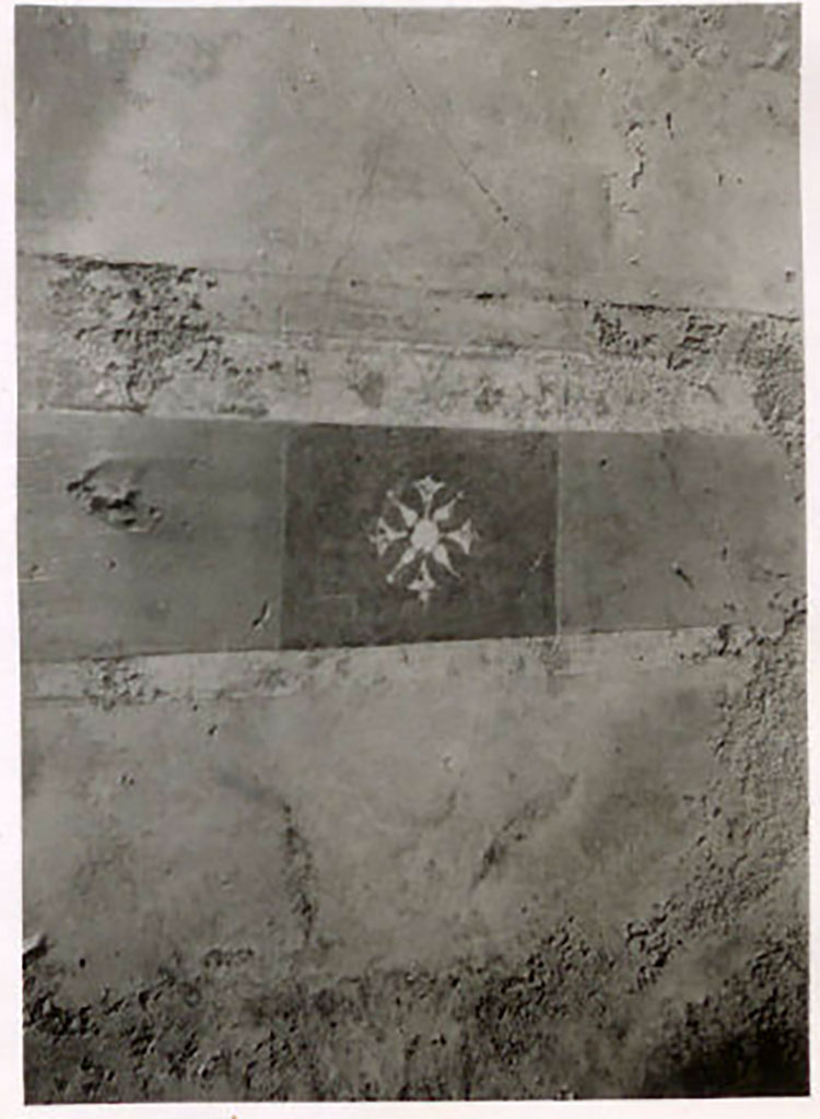 IX.1.22 Pompeii. Pre-1943. 
Room 19, painted star, from under the area of the central painting of west wall. Photo by Tatiana Warscher.
See Warscher, T. Codex Topographicus Pompeianus, IX.1. (1943), Swedish Institute, Rome. (no.137), p. 236.