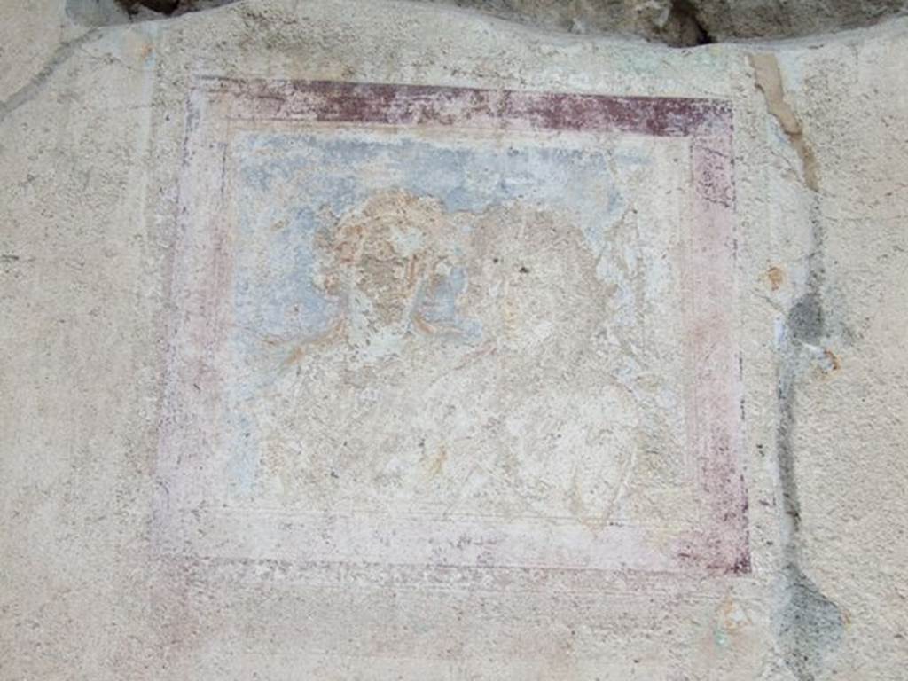 IX.1.22 Pompeii. December 2007. Room 19, wall painting on west wall, south side, probably Dionysus and Ariadne, Helbig 348b.   
Helbig identifies in the 1st room on the right behind the 1st peristyle: Hercules, Orpheus and Muses, 893, Acteon, 252, Bust of Dionysus and Ariadne, 384b.  
See Helbig, W., 1868. Wandgemälde der vom Vesuv verschütteten Städte Campaniens. Leipzig: Breitkopf und Härtel. (252, 384b).
See Schefold, K., 1957. Die Wande Pompejis. Berlin: De Gruyter. (p.238)