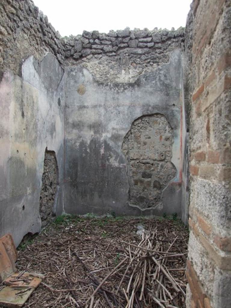 IX.1.22 Pompeii. December 2007. Doorway to room 23, looking south.
According to Bragantini etc, this cubiculum had a black dado.
On the south wall would have been a white panel in the centre with a painting of the toilette of Aphrodite, now lost.
The side panels would have been blue separated by narrow divisions (which were red).
The frieze was black.
The upper zone was faded and colourless but would have had architectural designs.
On the east wall would have been a black dado, in the central red panel of the middle zone would have been a banqueting painting with a couple on a bed.
The side panels would have been yellow.
On the west wall would have been a black dado, a red cornice, and blue panels in the middle zone.
See Bragantini, de Vos, Badoni, 1986. Pitture e Pavimenti di Pompei, Parte 3. Rome: ICCD. (p.404-5, cubicolo ‘z’)
See Helbig, W., 1868. Wandgemälde der vom Vesuv verschütteten Städte Campaniens. Leipzig: Breitkopf und Härtel. (1438 & 1447)
See Schöne in BdI, 1867, (p.85)