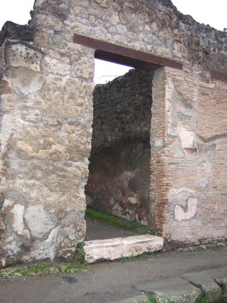 IX.1.26 Pompeii. December 2005. Entrance. According to Fiorelli, the atrium was found at the end of the entrance corridor, but without an impluvium. At the side was a cubiculum, followed by a triclinium decorated with various paintings of fish, birds and landscapes. 
Opposite was another cubiculum which was next to a small garden area from where the next room took its light, containing the stairs to the upper rooms and adjacent to the kitchen, the lararium preserved only the figures of the two serpents approaching the prepared altar.
Found in the atrium was the graffiti - STRONIVS
                                                                     STRONNIVS
                                                                     NIL SCIT
See Fiorelli, G. (1875). Descrizione di Pompei, (p.376)
See Pappalardo, U., 2001. La Descrizione di Pompei per Giuseppe Fiorelli (1875). Napoli: Massa Editore. (p.140)