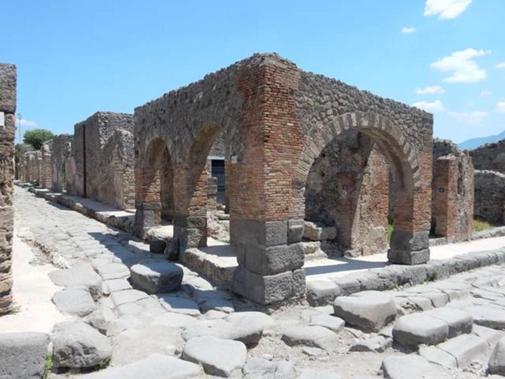 IX.2.1 Pompeii. May 2017. Looking east towards three arches on east side of Via Stabiana. 
Photo courtesy of Buzz Ferebee.