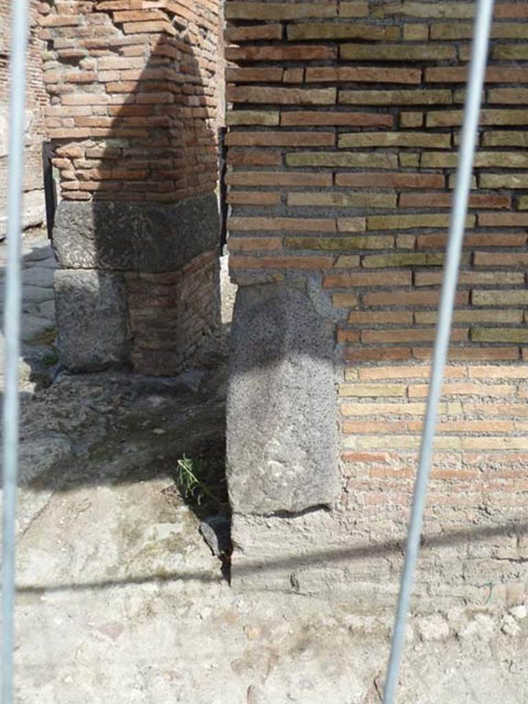 IX.2.1 Pompeii. September 2015. Lavastone on north corner of front facade. Looking east.