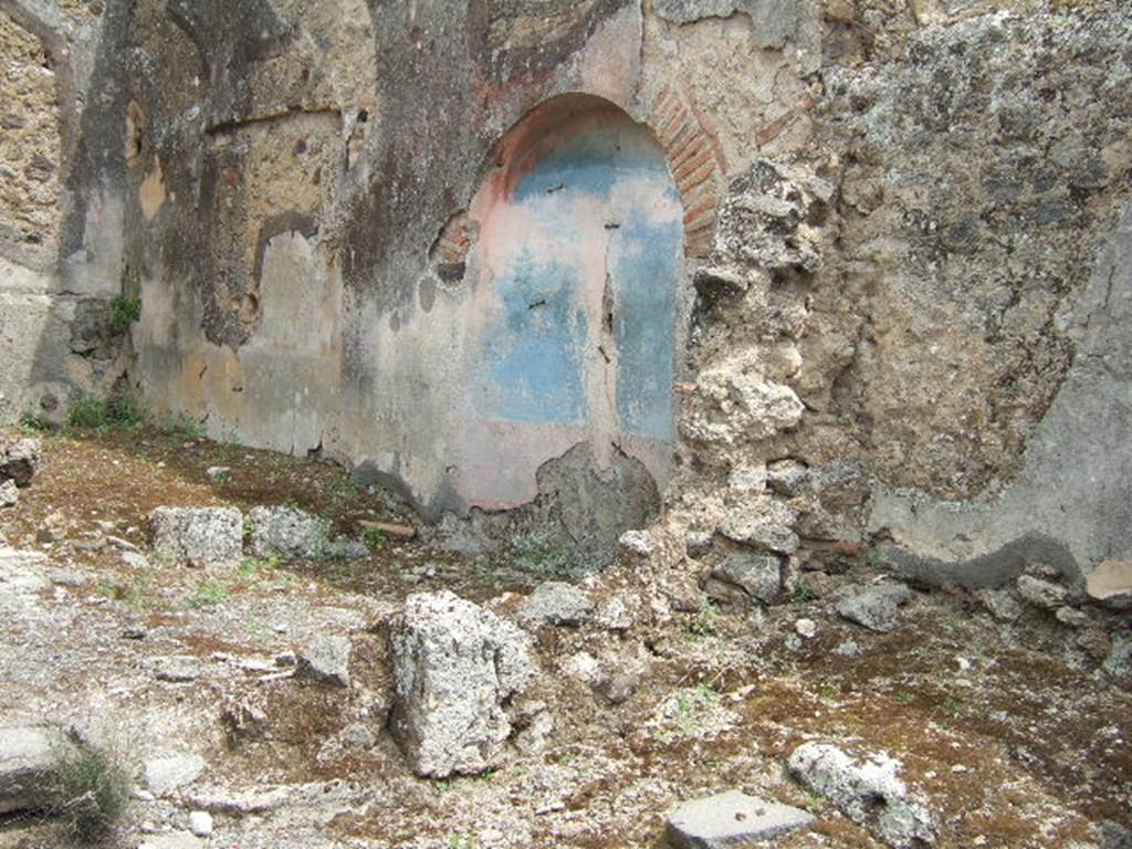 IX.2.7 Pompeii. May 2006. South side of garden and pool area.
According to the excavation reports, and Helbig’s description, the garden walls were painted with
• a painting of a statue with a club probably Hercules in a garden painting, Helbig 1119.
• a siren in a green cloak with a flute in both hands, Helbig 898b.
• a winged sphinx fountain  with a marble statue set in a garden painting, Helbig 1778b.
See Helbig, W., 1868. Wandgemälde der vom Vesuv verschütteten Städte Campaniens. Leipzig: Breitkopf und Härtel, 1119, 898b, 1778b.