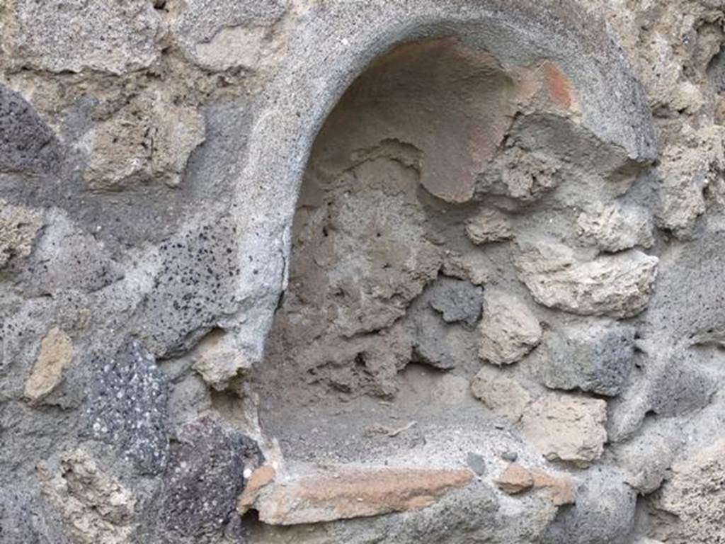 IX.2.11 Pompeii. December 2007.Niche on west end of north wall.
According to Boyce, this niche was painted red on the inside and may have been a Lararium.
See Boyce G. K., 1937. Corpus of the Lararia of Pompeii. Rome: MAAR 14. (p.80-81)