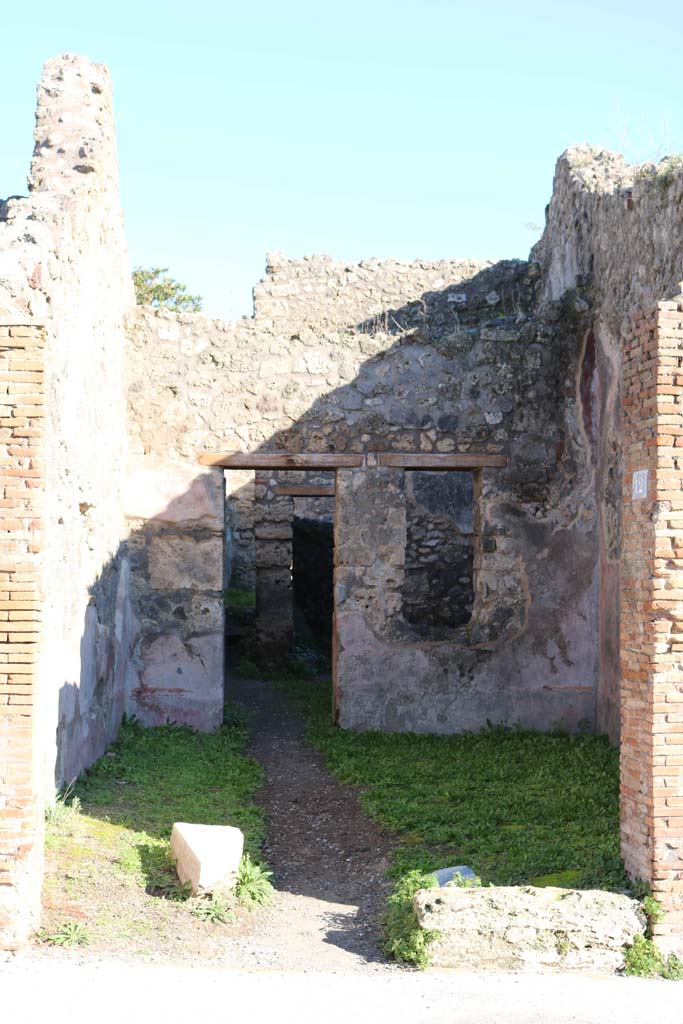 IX.2.12 Pompeii. December 2018. 
Looking east across shop to doorway to rear room. Photo courtesy of Aude Durand.
