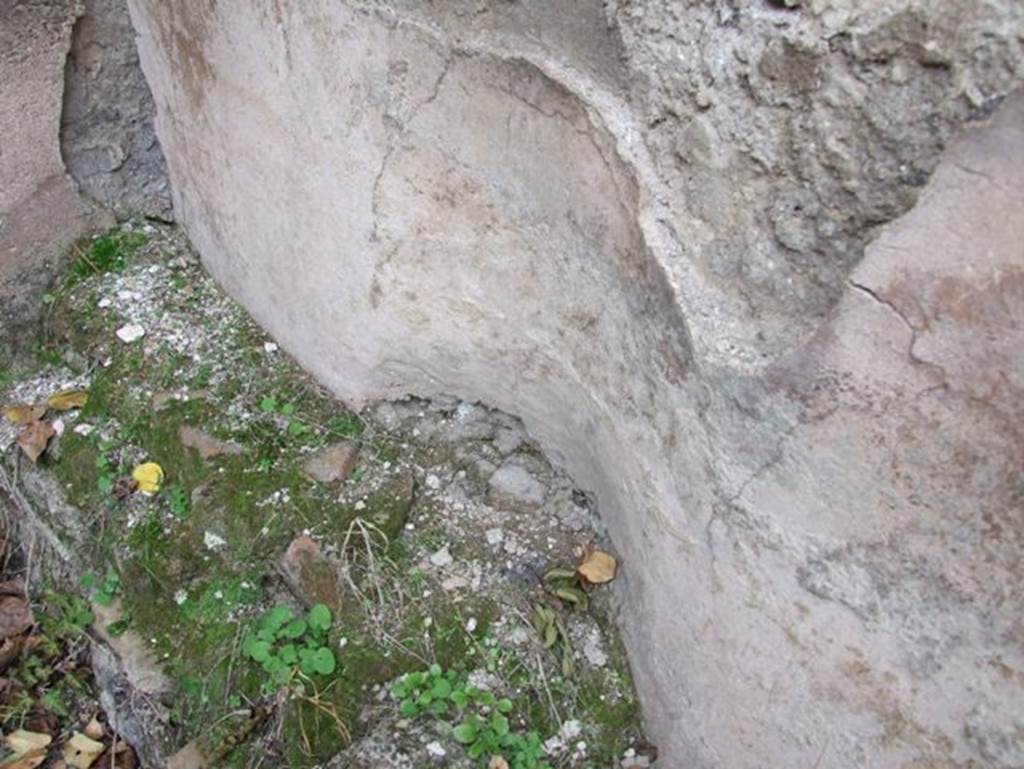 IX.2.16 Pompeii.  December 2007. Kitchen, with three sided structure around walls. 
Detail of north side and curved recess.