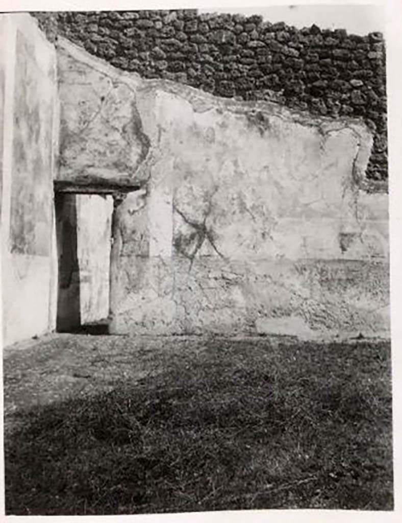 IX.2.16 Pompeii. Pre-1943. East wall at north end of atrium, with doorway to exedra. Photo by Tatiana Warscher.
According to Warscher – the painting of Hercules and Hesione has vanished (from the east wall of atrium).
Although Warscher called this room an exedra, she makes the point that this room was spacious and was probably used as a triclinium. 
The decoration was rich and exquisite of which the three new paintings were part.
See Warscher, T. Codex Topographicus Pompeianus, IX.2. (1943), Swedish Institute, Rome. (no.51.), p. 119.