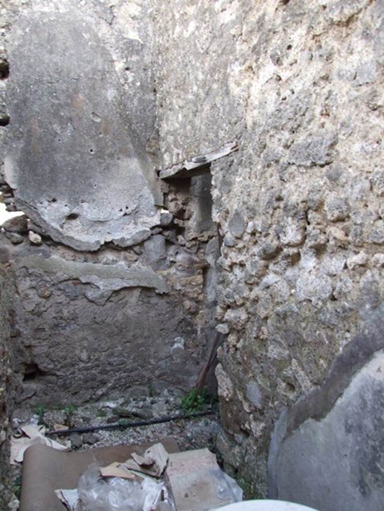 IX.2.16 Pompeii.  March 2009.  South west corner of small room with steps to upper floor.