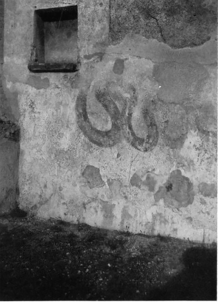 IX.2.18 Pompeii. c1930s. Room 11, garden area. Lararium on north wall of east portico. 
See Boyce G. K., 1937. Corpus of the Lararia of Pompeii. Rome: MAAR 14. (p.81 and Pl.1,4)