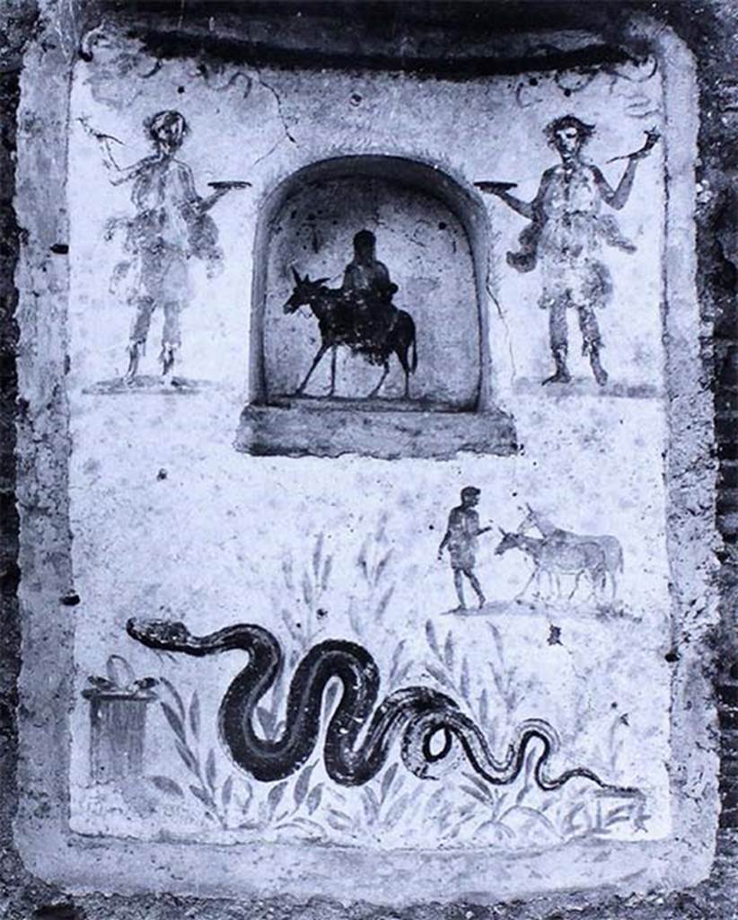 IX.2.24 Pompeii. Old photo of lararium and niche on west wall of stable.
According to Fröhlich, on the lower left was a painted altar with a snake approaching, through plants, from the right.  
Above right was a man leading two donkeys.  
In the niche was a female figure on a donkey, perhaps Vesta, Epona or Isis-Epona. 
Two Lares were at the top, one on either side of the niche.  
See Fröhlich, T., 1991, Lararien und Fassadenbilder in den Vesuvstädten.  Mainz: von Zabern.  (L99: p.293, T. 42,3).