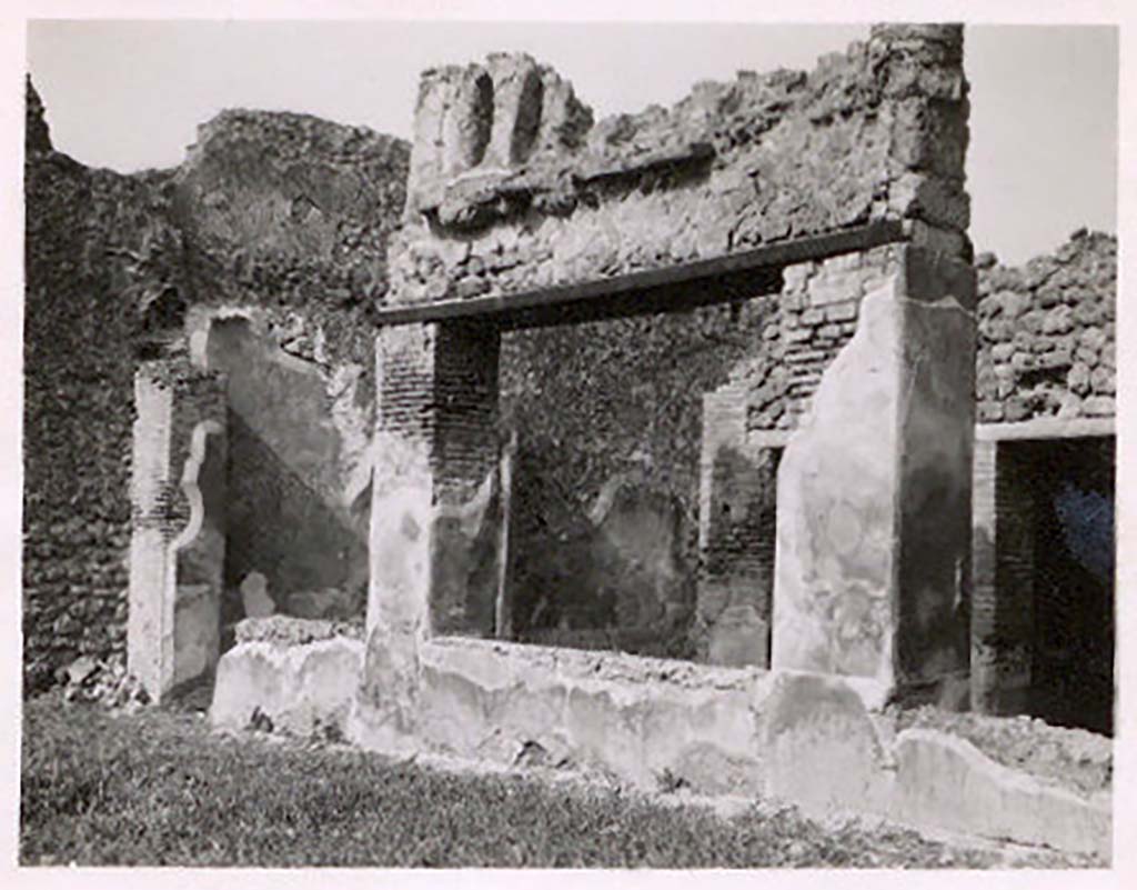IX.2.26, Pompeii. Pre-1943. Photo by Tatiana Warscher.
According to Warscher, “this photo is taken by the north portico of the pseudo-peristyle, that had a terrace. 
On the plan by Fiorelli, the two rooms to the south of the pseudo-peristyle are not shown, but here the doorways are seen.”
(We think Warscher has made a mistake here –
according to the photos below (1966 by Jashemski and one from 1979), the above photo is looking north (or north-west) towards the west wall of the tablinum and the doorways of two corridors, one largely obscured by the pilaster in front).
See Warscher, T. Codex Topographicus Pompeianus, IX.2. (1943), Swedish Institute, Rome. (no.134.), p. 241.