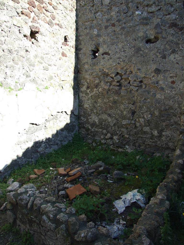 IX.3.2 Pompeii. March 2009. 
South east corner of kitchen, latrine, cella penaria and well or fountain room.