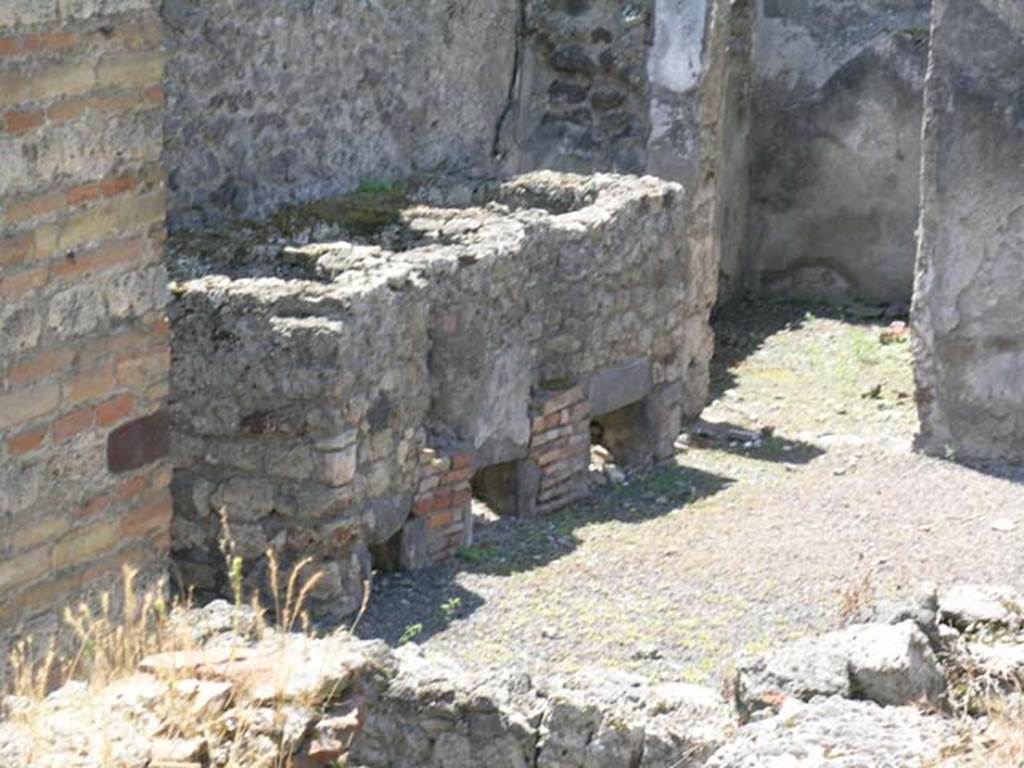 IX.3.2 Pompeii. June 2005. Three masonry boilers against south wall of former atrium.
Photo courtesy of Nicolas Monteix.