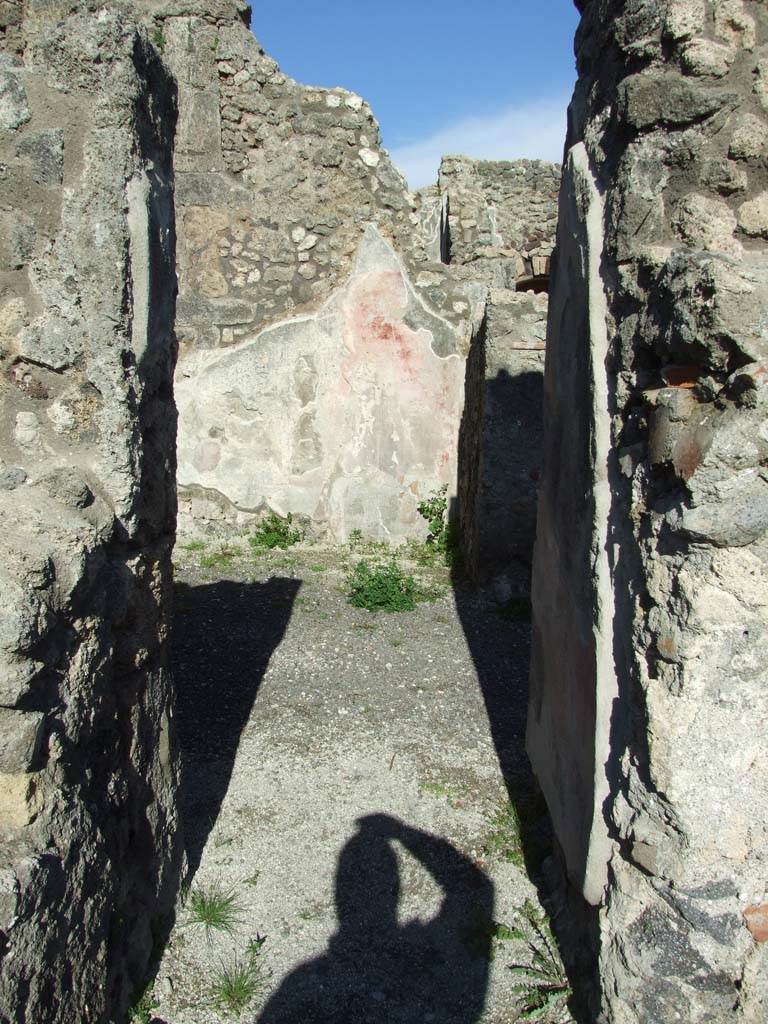 IX.3.2 Pompeii. March 2009. 
Room on north side of garden area. Looking east through small door from former atrium.
