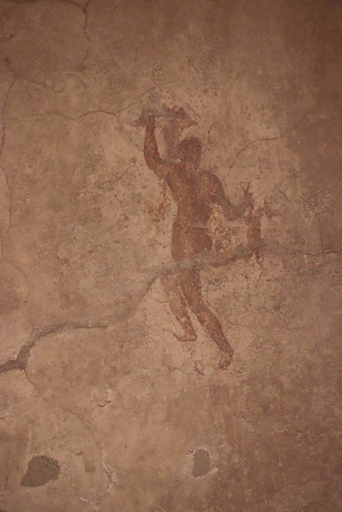IX.3.5 Pompeii. October 2023. 
Room 15, painted figure from west end of south wall. Photo courtesy of Klaus Heese.