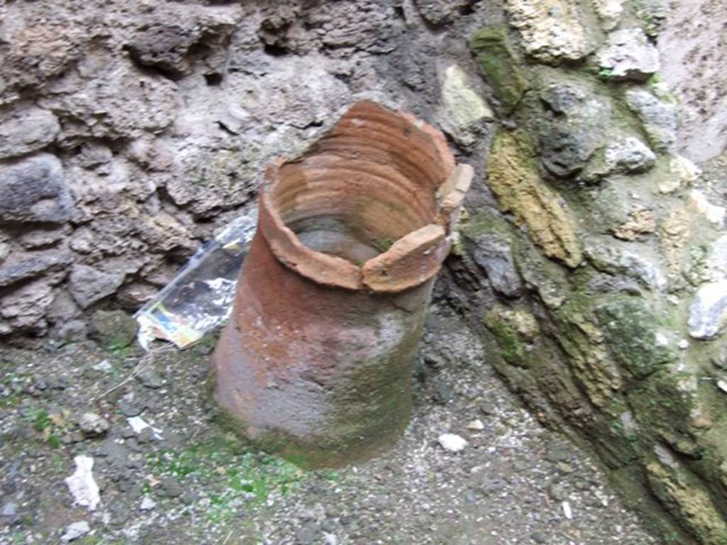 IX.3.13 Pompeii.  March 2009.  Remains of terracotta puteal , in corner of kitchen area.
