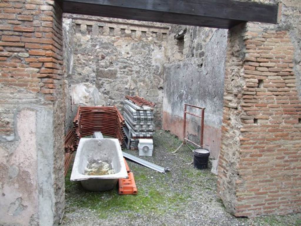IX.3.19 Pompeii.  December 2007.  Room 13, a triclinium. According to PPP, the only known decorations of this room were in the panels, and showed vignettes of female flying figures.
According to Fiorelli, “There were two tricliniums lit by windows, the first of which was decorated with two figures of Baccantes, one with thyrsus in hand and a basket on the head, the other carrying a thyrsus in the right hand and a vase in a basket in the left hand. There was also a head of Diana, facing forward, with quiver on the shoulder.”
See Pappalardo, U., 2001. La Descrizione di Pompei per Giuseppe Fiorelli (1875). Napoli: Massa Editore. (p.147)
and Fiorelli, G., (1875). Descrizione di Pompei, (p.397-8)