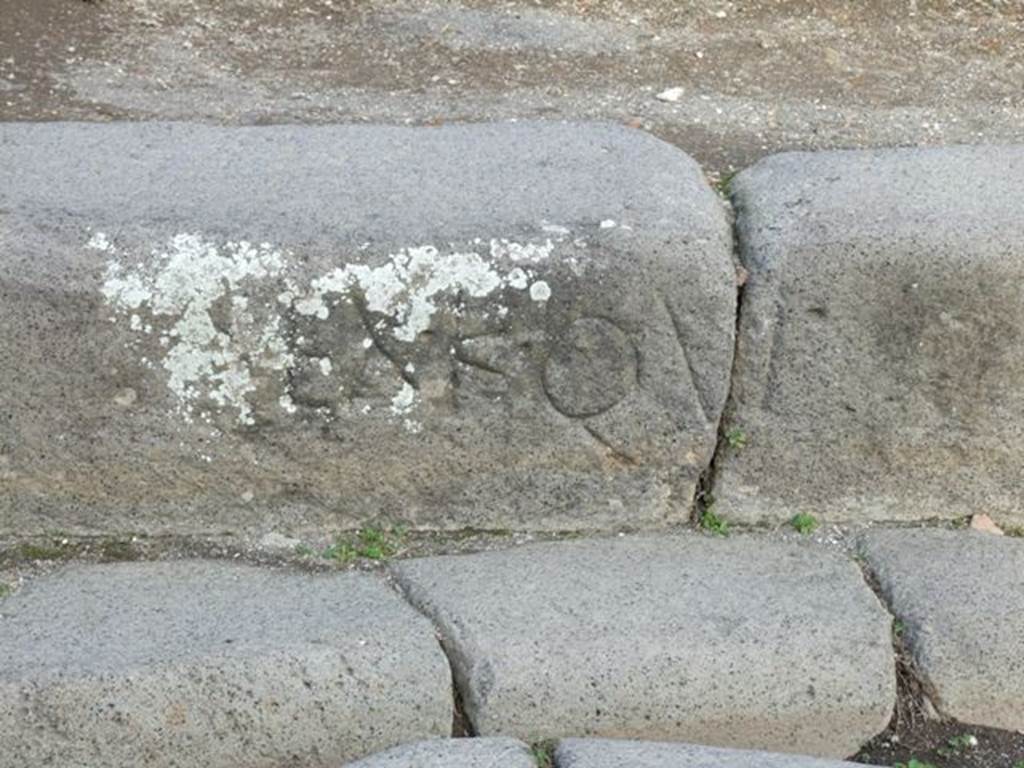 EX.K.QUI cut into the edge of the pavement outside IX.4.1.