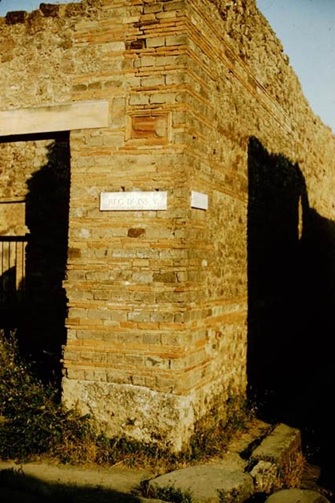 IX.5.1 Pompeii. 1957. Looking towards corner of Vicolo di Tesmo, with terracotta phallus in plaque. Photo by Stanley A. Jashemski.
Source: The Wilhelmina and Stanley A. Jashemski archive in the University of Maryland Library, Special Collections (See collection page) and made available under the Creative Commons Attribution-Non Commercial License v.4. See Licence and use details.
J57f0317